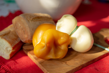 Smoked and white Fresh South Italian traditional cow or cow and sheep semi-soft cheese Scamorza...