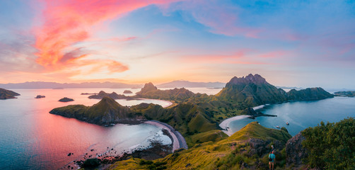 Panoramic colorful sunset view of Padar Island in an evening from Komodo Island (Komodo National Park), Labuan Bajo, Flores, Indonesia