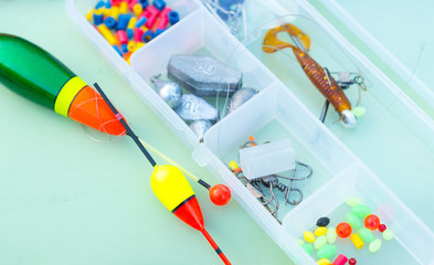 tiny elements of amateur, hobby fishing equipment including floats and corn