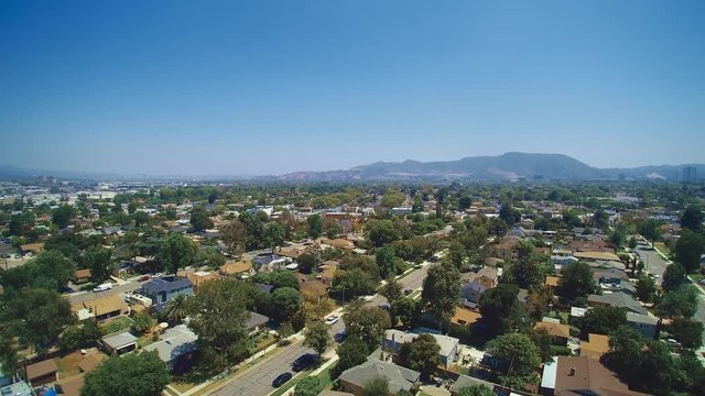 Orbital aerial shot over North Hills in the Valley in California