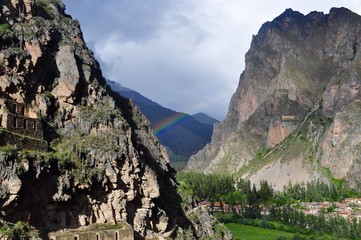 Rainbow between peruvian mountains