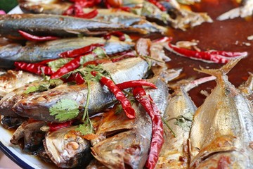 Boiled fish sauce at market