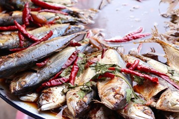 Boiled fish sauce at market