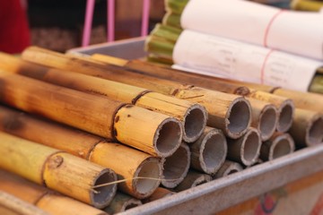 Rice roasted in bamboo