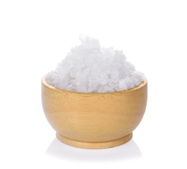 salt in a wooden bowl isolated on white background