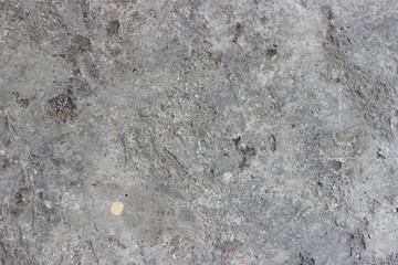 Abstract dirty rough holey perforated unpolished cement concrete texture