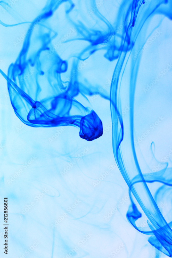 Poster blue ink drop dynamic motion in water. abstract background