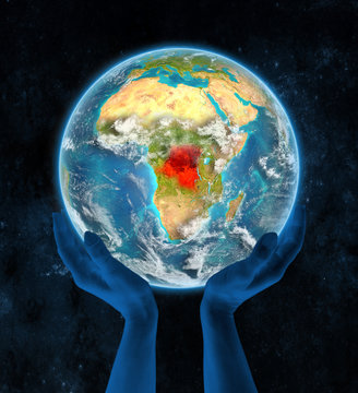 Democratic Republic of Congo on planet Earth in hands