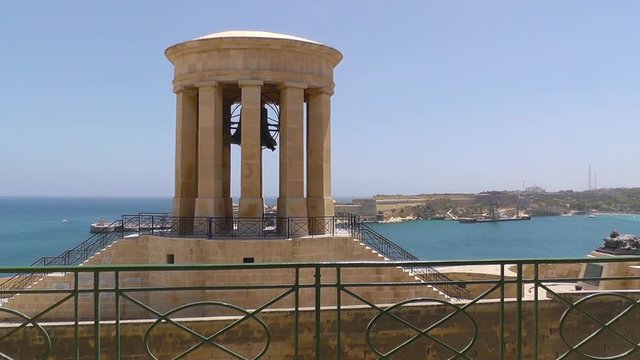 The Siege Bell Memorial at St Christopher Bastion at Grand Harbor, Valletta, Malta.