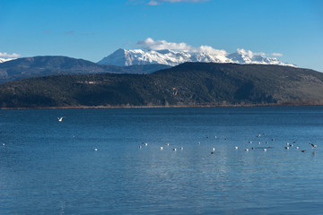 Amazing winter Landscape of Lake Pamvotida and Pindus mountain from city of Ioannina, Epirus, Greece