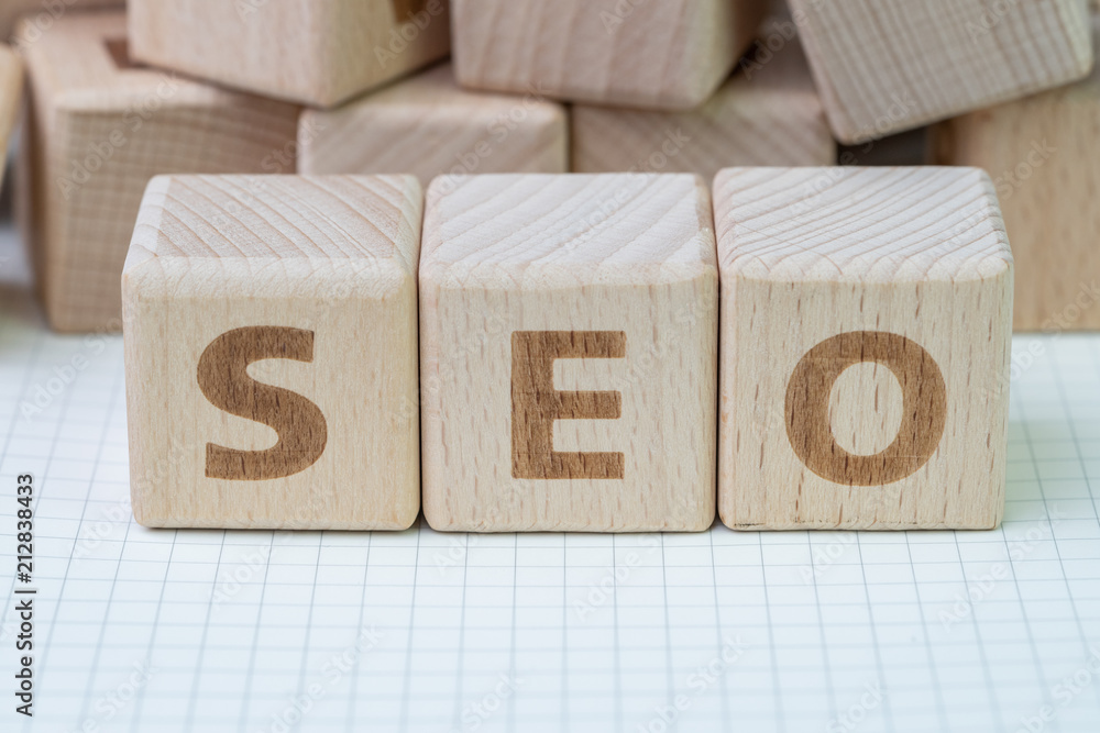 Poster seo, search engine optimization ranking concept, wooden cube block with alphabets abbreviation seo a