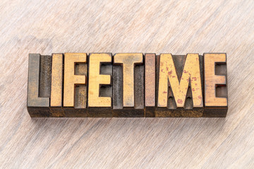 lifetime - word abstract in wood type