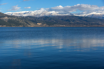 Amazing winter Landscape of Lake Pamvotida and Pindus mountain from city of Ioannina, Epirus, Greece