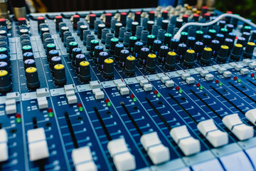 Obraz premium Audio mixing console working