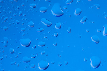 Waterdrops on blue background