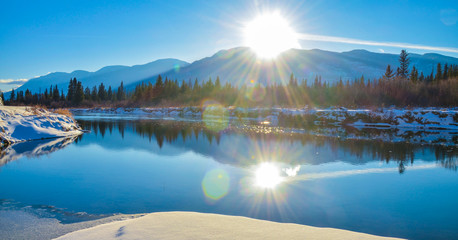 Sun flare reflection winter landscape