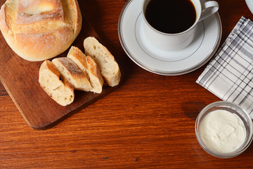 Close up of toast, coffee and cheese cream