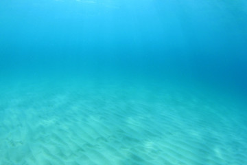 Clear blue water background in ocean  