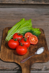 tomato vegetables on cutting Board