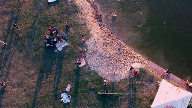 POLTAVA, UKRAINE - JUNE 18, 2016: people have a happy time in park near lake