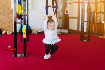 Little girl in the gym