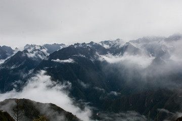 Panoramic inspirational view of the Andes mountains in mist on the Inca Trail. Peru. South America. No people.