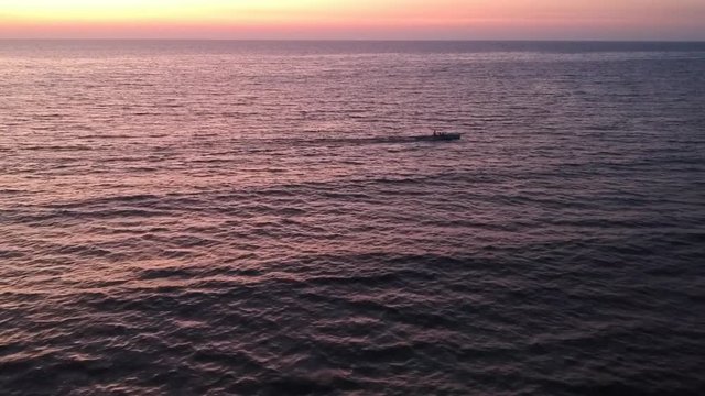 Showing the scale of a boat in the ocean