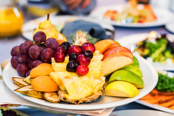 Beautiful fruit plate on festive table
