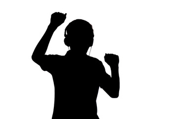silhouette of teenager listening to music in headphones and dancing on white isolated background