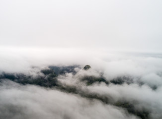 aerial view of cloudscape and roll of hills