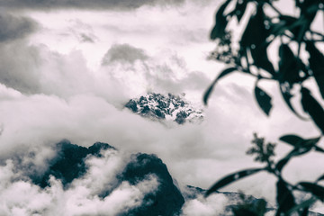 Clouds covering Andes mountains peaks from the Inca Trail. Peru. South America. No people.