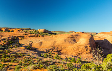 Scenery at Delicate Arch, Arches National Park, Utah, on a bright sunny day