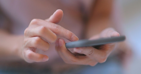 Close up Woman use of mobile phone