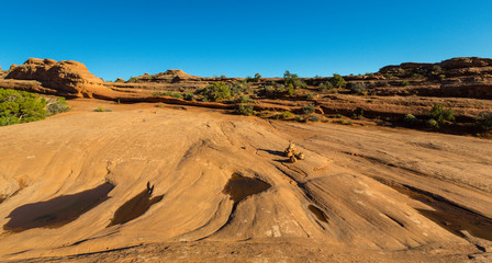 Scenery at Delicate Arch, Arches National Park, Utah, on a bright sunny day