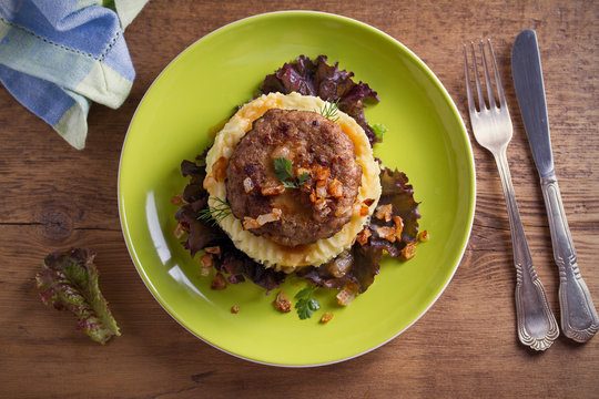 Delicious Burger Or Patty With Mashed Potato On Lettuce, Served With Salty Caramelized Onion. Overhead, Horizontal