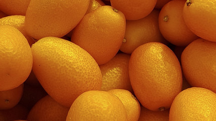 The close-up of ripe kumquat. The background of fresh kumquat.