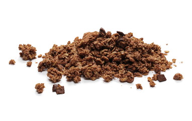 Crunchy chocolate granola, muesli pile isolated on white background