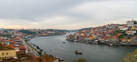 Fototapeta na wymiar Panoramic view of Old Porto Oporto city and Ribeira over Douro river from Vila Nova de Gaia, Portugal