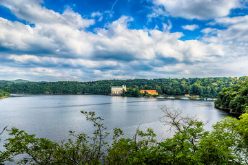 Fototapeta premium Orlik castle with blue sky and trees-Orlik nad Vltavou South Bohemia, Czech Republic