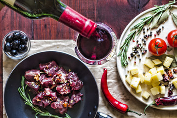 wine, Cheese canapes, Man, pours wine, snack, meat, cherry tomatoes, dinner, Top view, closeup....