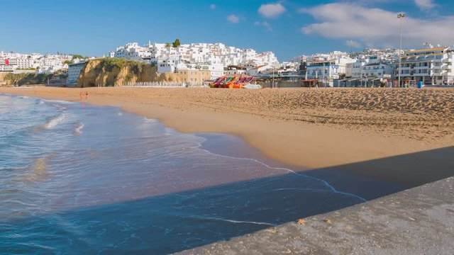 Atlantic ocean sandy beach in Portugal town Albufeira