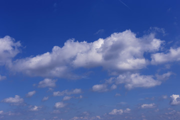 Beautiful blue sky with white clouds as a natural background.