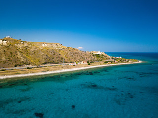 Fototapeta na wymiar Vista aerea di capo Spartivento a Spropoli in Calabria con la meravigliosa costa e il mare blu