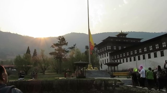 Bhutanese flag is lowered during flag ceremony at Thimphu Dzong