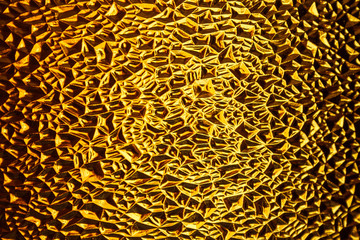 Decorative relief glass in the door. Background. Close-up.