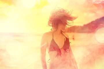 happy girl beach sea / girl in summer on the beach freedom wind wet hair, concept of summer vacation young beautiful girl