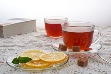 hot black tea with lemon and mint fragrant fresh glass glass still life hand glass