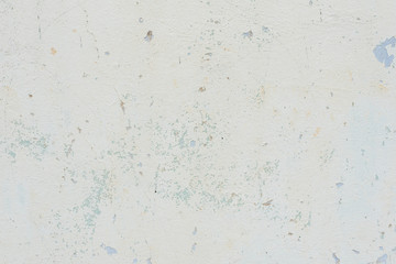 Wall fragment with scratches and cracks