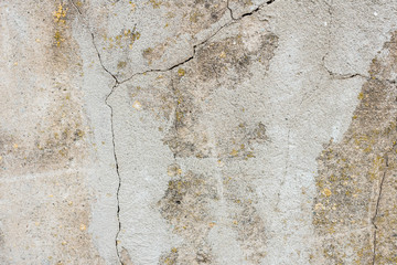 Wall fragment with scratches and cracks