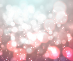 Festive light background with bokeh and stars